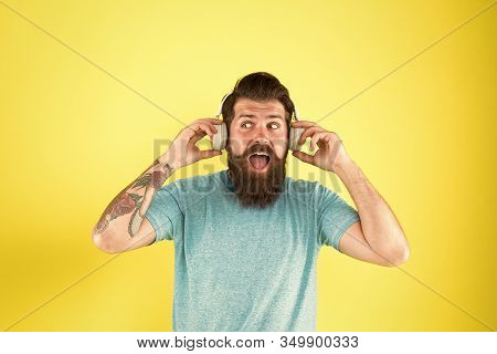 Wireless Headphones Deliver Clean Sound. Modern Technology. Hipster Happy Using Modern Wireless Head