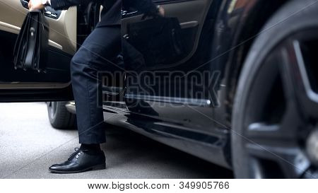 Successful Businessman Getting Out Of Premium Class Car, Arrival To Workplace
