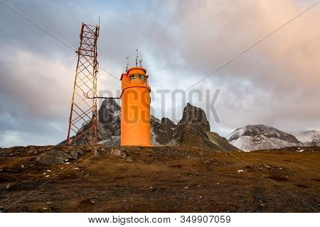 The Lighthouse Of Hvalnes In East Iceland With Eystrahorn Mountain In The Background