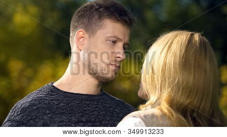Sad Male Looking At Female, Relationship Crisis, Miscommunication Problem