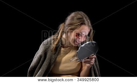 Crying Young Woman With Wounded Face Looking Mirror And Crying Black Background