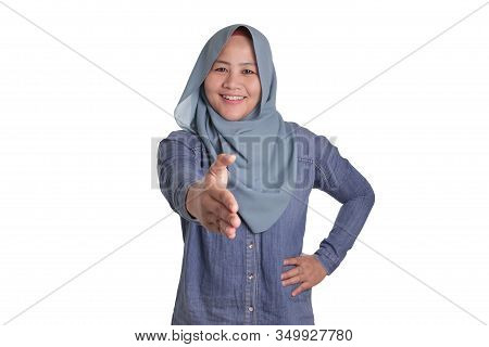 Muslim Businesswoman Offering Hand Shake
