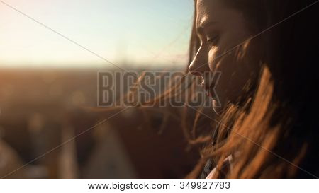 Lonely Pensive Young Lady Standing On Skydeck, Upset Wit Personal Troubles