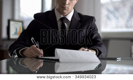 Serious Boss Signing Agreement, Important Contract For Company Restructuring