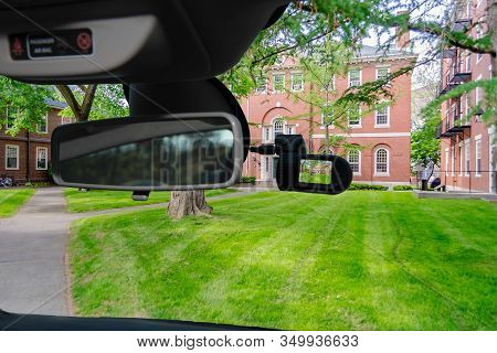 Looking Through A Dashcam Car Camera Installed On A Windshield With View Of The Harvard University C