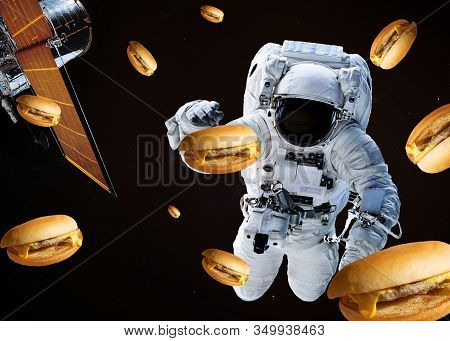 Satellite Telescope Near To Astronaut With Burgers Somewhere In Space. Science Fiction Wallpaper. El