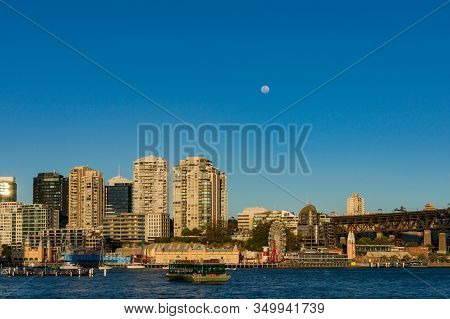Sydney Suburb Milsionspoint With Residential And Commercial Buildings And Full Moon Above