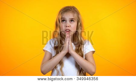 Little Girl Praying For Dearest Wish Come True Anxious Before Exam Advertisement