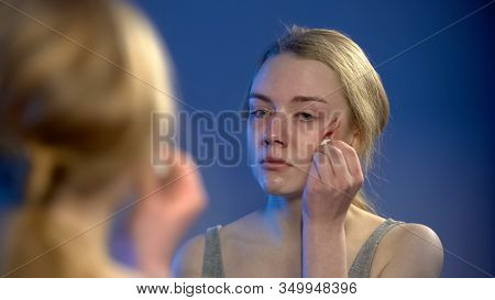 Scared Young Lady Disinfecting Face Wound In Front Of Mirror Misbehavior Problem