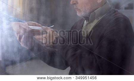 Female Hands Giving Plate With Tasteless Porridge To Old Man, Nursing Home Diet