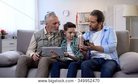 Multiage Family Members Choosing Presents Online, Mobile Shopping Application