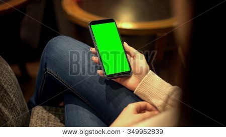 Lady Holding Smartphone With Green Screen, Place For Advertisement, Technologies
