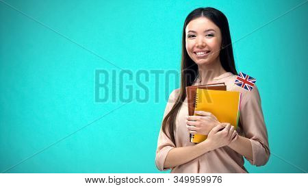 Cheerful Woman Holding British Flag Book, Education Abroad, Learning Language