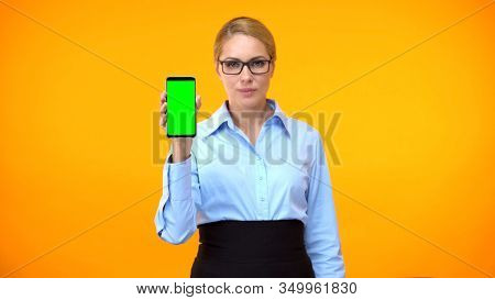 Female Manager Showing Mobile Green Screen, Online Presentation, Planner App
