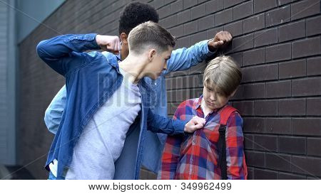 Cruel Students Threatening To Punch Junior Boy, School Bullying, Intimidation