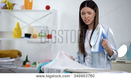 Awkward Housewife Displeased With Made Hole During Ironing, Domestic Routine