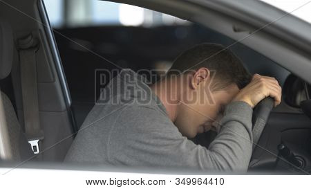Bored Male Driver Getting Stuck In Traffic Jam, Exhausted By Awaiting, Rush Hour