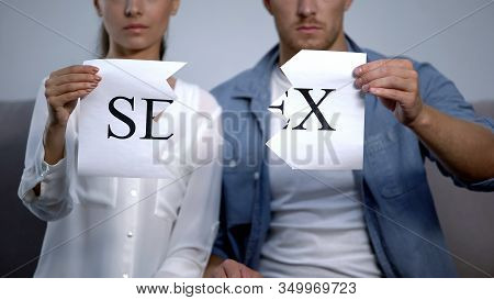 Couple Tearing Into Pieces Sex Word On Cardboard, Sexual Life Disorder, Problems