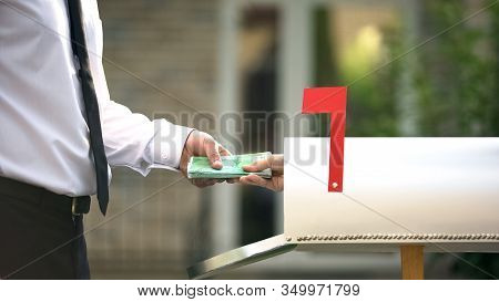 Man Receiving Euros From Mailbox, Using Transfer Service, Financial Operations