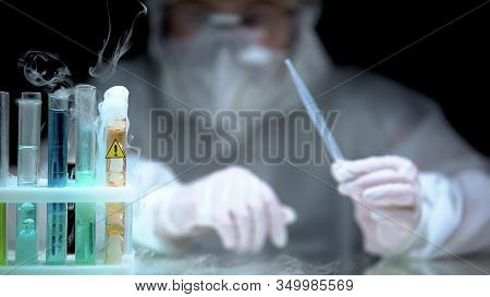 Liquid With Warning Symbol On Test Tube Boiling, Forbidden Experiment, Crime