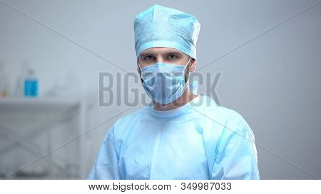 Professional Surgeon Medical Face Mask Looking At Camera, After Operation