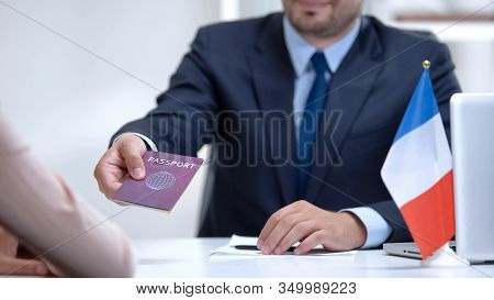 French Consular Officer Giving Passport To Woman, Refugee Visa, Asylum Status