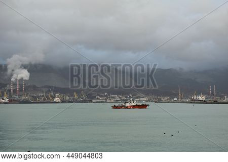 Pilot Boat In The Port. View City And Mountain