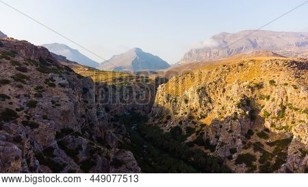 Empty Rural Road Through The Beautiful Gorge Of Kourtaliotikos In Crete Island In Greece.