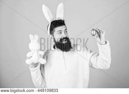 Easter Activities Concept. Weirdo Concept. Celebrate Easter. Guy Bearded Hipster Weird Bunny With Lo