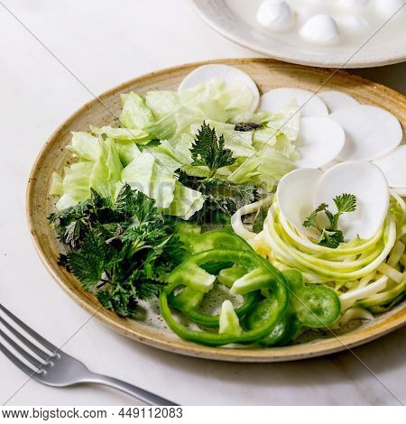 Green Raw Vegetables And Herbs For Salad