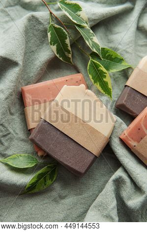 Handmade Soap Bars And Green Leaves