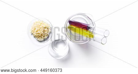 Candelilla Wax In Chemical Watch Glass, Potassium Permanganate And Nickle Chloride Liquid In Test Tu