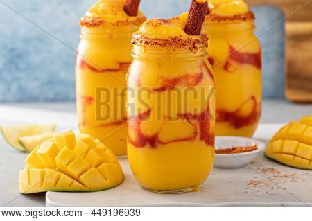 Mangonada Mexican Mango Smoothie With Chamoy Sauce And Lime Seasoning