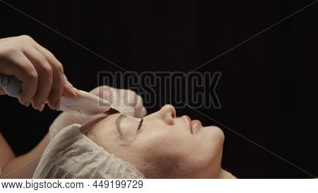Woman Cleansing Facial In Spa Salon. Water Oxygen Face H2o2 Small Bubble Facial Rf Lifting Equipment