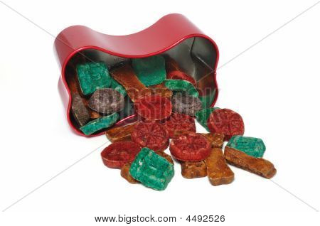 Dog Treats Spilling Out Of Bone Shaped Container