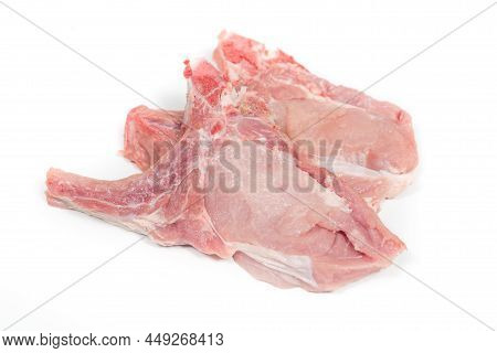 Raw Loin Chops In A White Background