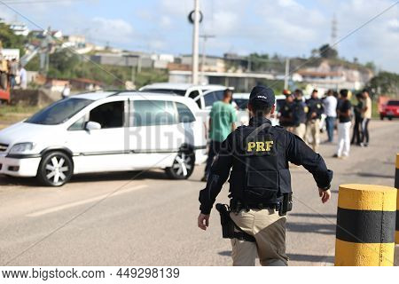 Simoes Filho, Bahia, Brazil - October 11, 2018: Agent Of The Federal Highway Police - Prf - Inspects