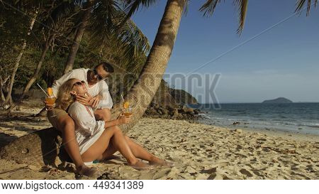 Loving Couple In White Dress And Sunglasses, Near Palm Tree, Rel