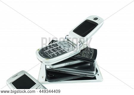 Old And Obsolete Cell Phone Isolated On White Background.