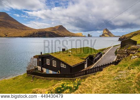 View Of The Bour On Vagar Island. A Small Village Situated On The Slope Of A Hill. Faroe Islands.