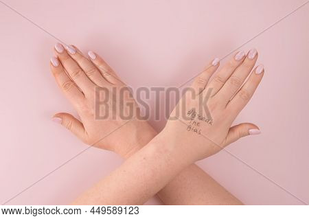 Break The Bias Women's Day 2022 Concept.  Symbol Of Woman's International Day. Woman Arms Crossed To