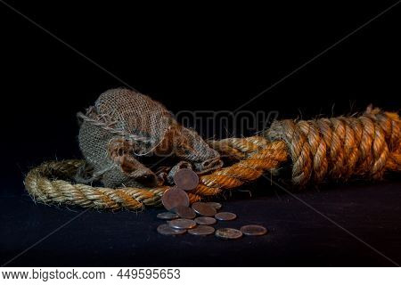 Gallows And 30 Silver Coins, Symbols Of The Betrayal Of Judas, On A Black Background