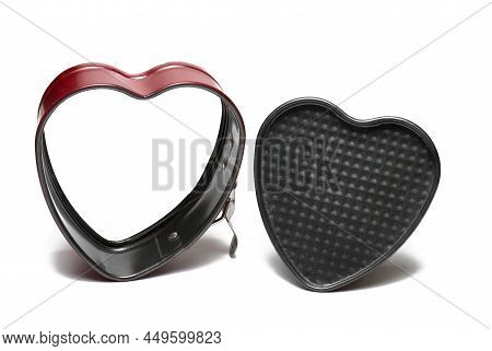 Close Up Of Cute Little Heart Cake Pan With Bottom Taken Out For Baking Lovely Pastries On White Bac