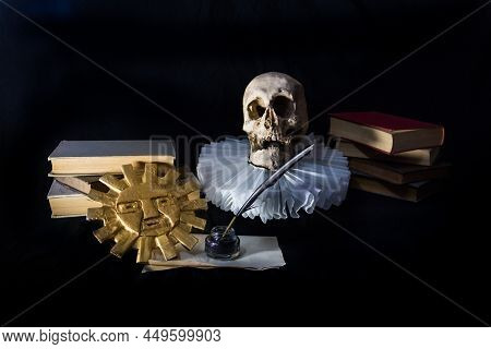 On A Black Background Books With A Human Skull, A Ruff And The Inca Sun, Symbols Of Universal Litera