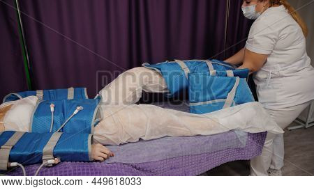 Woman Receiving Anti-cellulite Pressotherapy Lymphatic Massage Drainage Machine, Hardware Cosmetolog