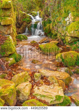 Crystal Water Creek In A Beech Forest In Autumn. Hayedo De La Biescona, Asturias, Spain