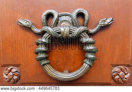 European Vintage Old Metal Wrought Iron Door Knocker. Design Detail. Paris.