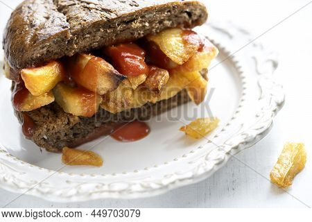 Close Up Of Traditional British Chip Butty Sandwich