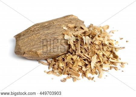 Agarwood, Aloeswood, Eaglewood Or Gharuwood. Piece Of Wood And Shavings. Isolated.