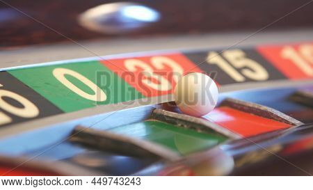 Ball On French Roulette Table In Casino. Wheel Spinning, Turning Or Rotating. Odd And Even Numbers, 